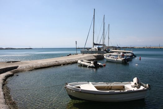 Boats and sailing boats at Loutraki,the second harbor of Skopelos island,Greece