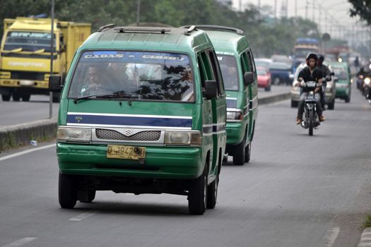 bandung, indonesia-june 5, 2014-public transportation in bandung city called angkot