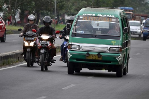 bandung, indonesia-june 5, 2014-public transportation in bandung city called angkot