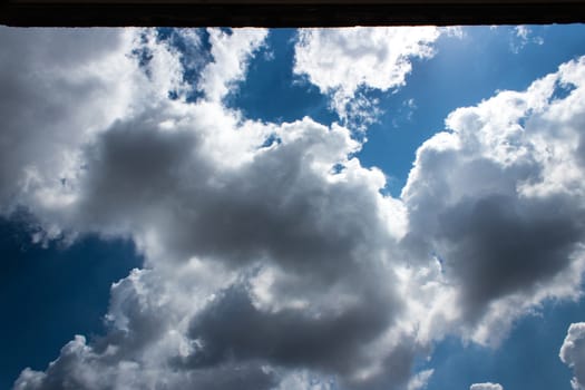 Tropical blue sky with sun and clouds in the afternoon