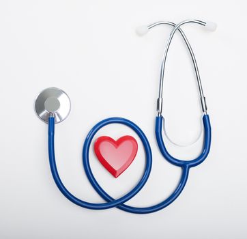 Blue stethoscope and heart shape, cardiovascular diseases and prevention concept.