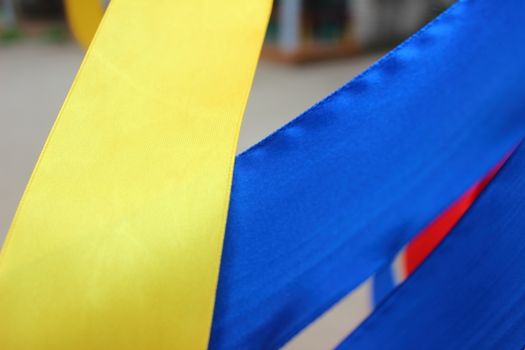Two ribbons, blue and yellow flag as a symbol of Ukraine