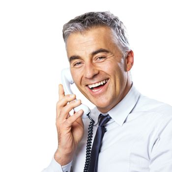 Attractive confident businessman talking on the phone on white background.