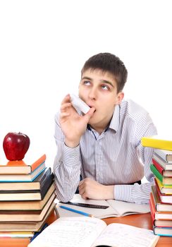 Student with Inhaler at the School Desk on the White Background