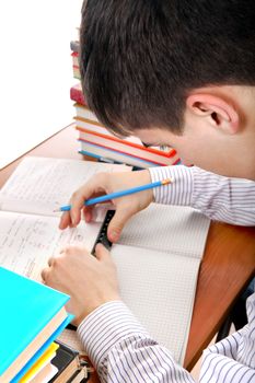 Student preparing for Exam at the School Desk