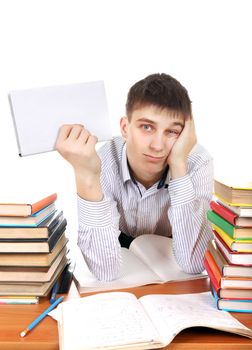 Tired Student with the Book at the School Desk Isolated On the White