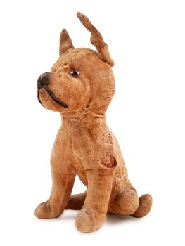 vintage toy dog, stuffed with straw, isolated on white background