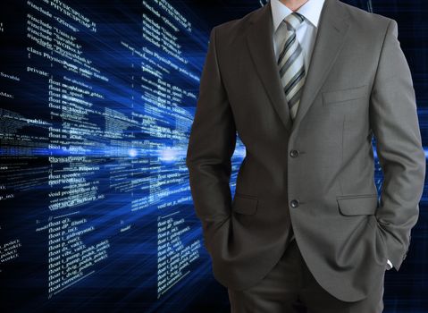 Businessman in a suit with background of glowing digital code. Business concept