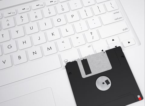 Floppy disk on the keyboard. View from above