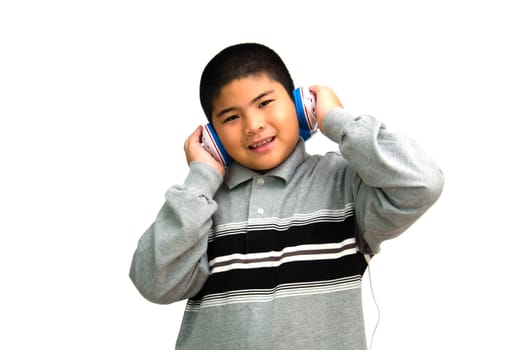 Boy listens attentively to the music isolated on white background