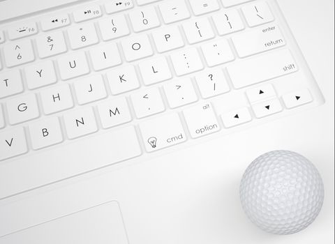 Golf ball on the keyboard. View from above