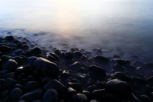 Twilight:An island of smooth polished rocks in formation, a tourist attraction near Koh Lipe (aka Ko Lipeh)