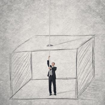 Concept of businessman escape from a box . Photo compilation with hand drawn background.