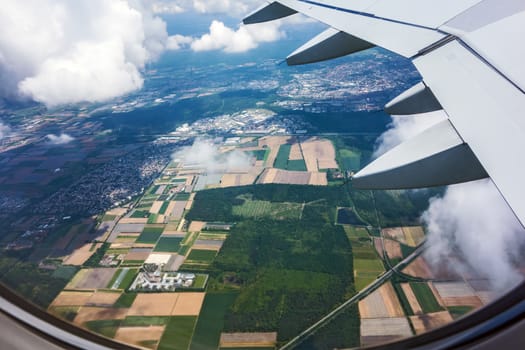 over rural landscape, view during a flight over fields and forest