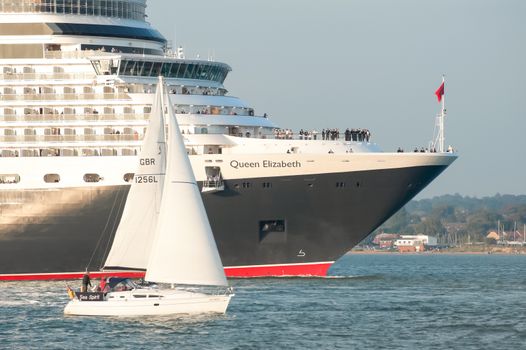 Southampton, UK - October 12, 2010: The new Queen Elizabeth cruise liner leaving the port of Southampton, UK on her maiden voyage.