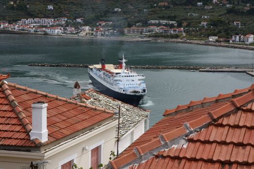 Ferry entering Grrek port Skopelos on Skopelos island