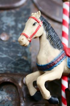 Antique Christmas tree ornament against a worn background