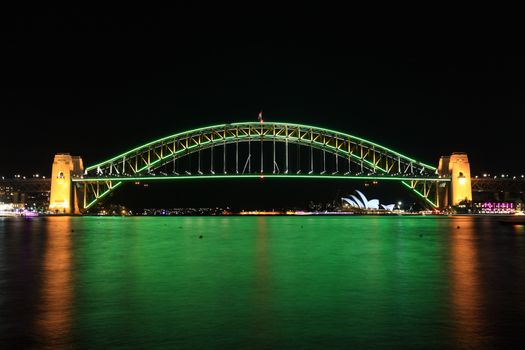 NTH SYDNEY, AUSTRALIA - JUNE 2, 2014; Sydney Harbour Bridge im Aussie colours of green and gold during Vivid Sydney annual festival celebrations.
