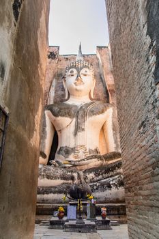 the ancient buddha in the historical Thai temple in the North