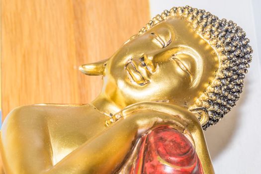 the gold sleeping buddha in the Thai temple donated from Thai community. Public buddha