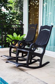 Couple vintage wooden arm chairs, stock photo