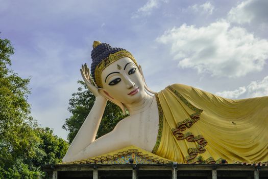 Beautiful lying budha at Wat Pratatsutone Mongkonkiri. This Budha statue is built from donation money of the people in the village and surrounding areas for the meaning of Budhism dedication.