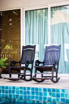 Couple wooden arm chairs for relaxing, stock photo