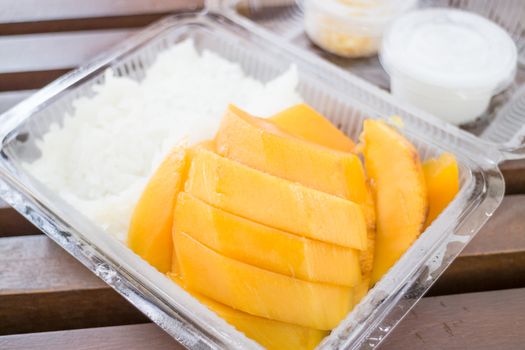 Tropical dessert box of sweet mango and sticky rice, stock photo