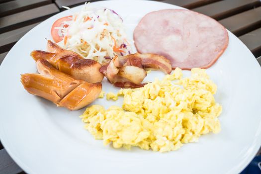 Breakfast plate serving with scrambled egg, stock photo