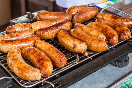 Grilled Thai sausages on the stove, stock photo