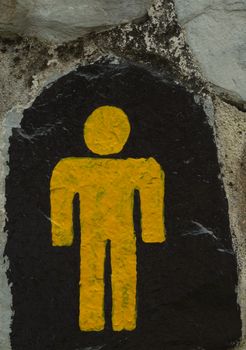 The symbol for the male toilet