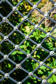 the metal fence is used for the great security of the park