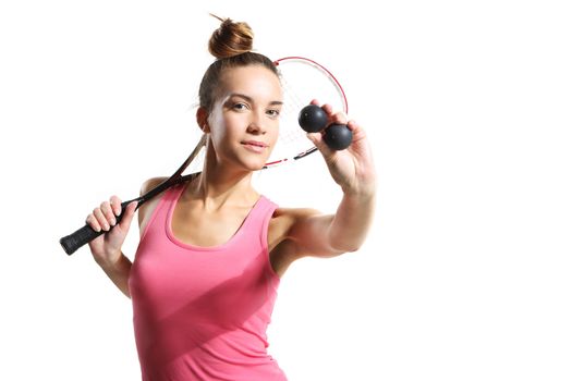 Beautiful athletic woman with squash racket