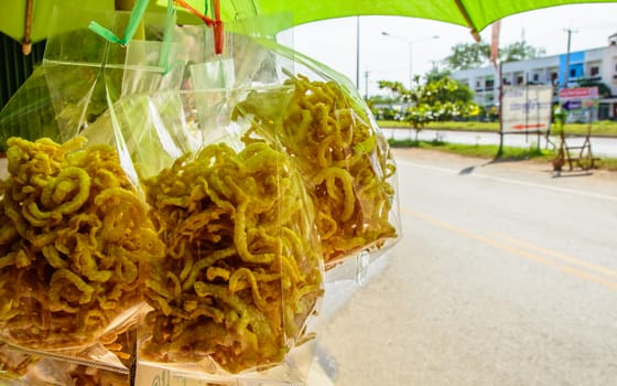 Traditional Thai home made pork cracker. It could be eaten with local Thai chilli paste.