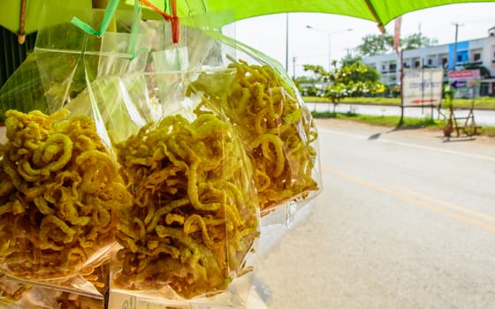 Traditional Thai home made pork cracker. It could be eaten with local Thai chilli paste.