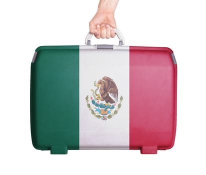 Used plastic suitcase with stains and scratches, printed with flag, Mexico