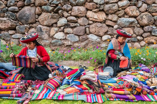 Cuzco, Peru - July 15, 2013: women selling handcraft in the peruvian Andes at Cuzco Peru on july 15th, 2013