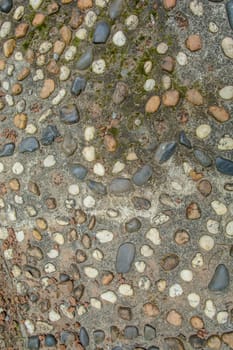 the old stone wall of the public toilet.