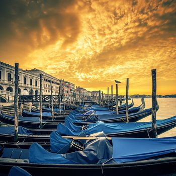 View of Venice with gondolas at sunrise, Italy