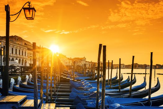 View of Venice with gondolas at sunrise