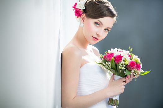 Gorgeous bride on her wedding day (color toned image; shallow DOF)