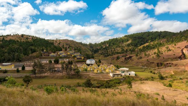 Malagasy homes build along the hills of  the central highlands of Madagascar