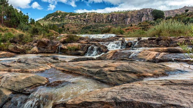 Beautiful and tranquil landscapes of Madagascar with multiple levels of small waterfalls