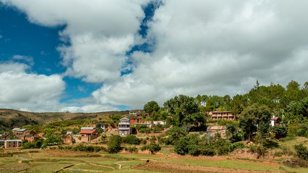 Malagasy homes build along the hills of  the central highlands of Madagascar