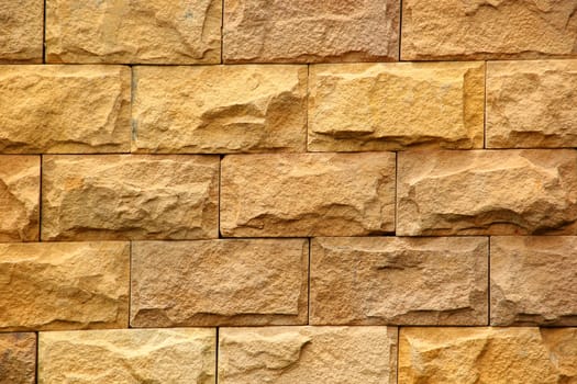 Brown stone brick wall with for background