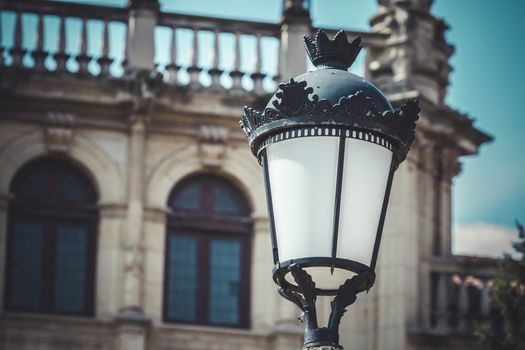 traditional street lamp with decorative metal flourishes