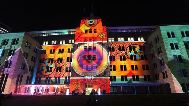  SYDNEY, NSW, AUSTRALIA - JUNE 2, 2014; Museum of Contemporary Art comes alive with projections of moving imagery and music  during Vivid Sydney festival event for locals and tourists to enjoy.