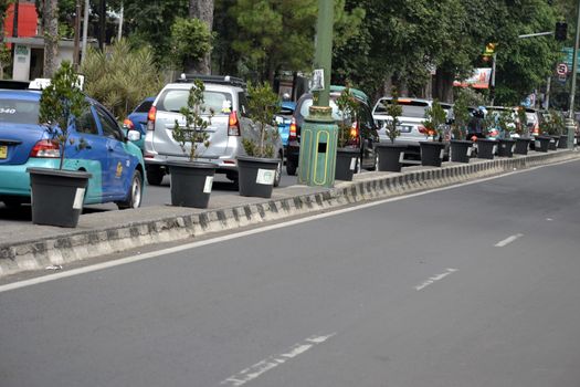 bandung, indonesia-june 9, 2014-scenery of busy traffic in bandung city, west java-indonesia