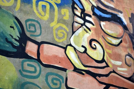 wall graffiti that ilustrated man get smoking