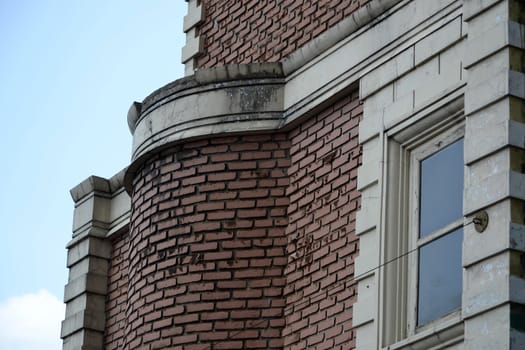 castle exterior that built with brown brick and solid concrete wall
